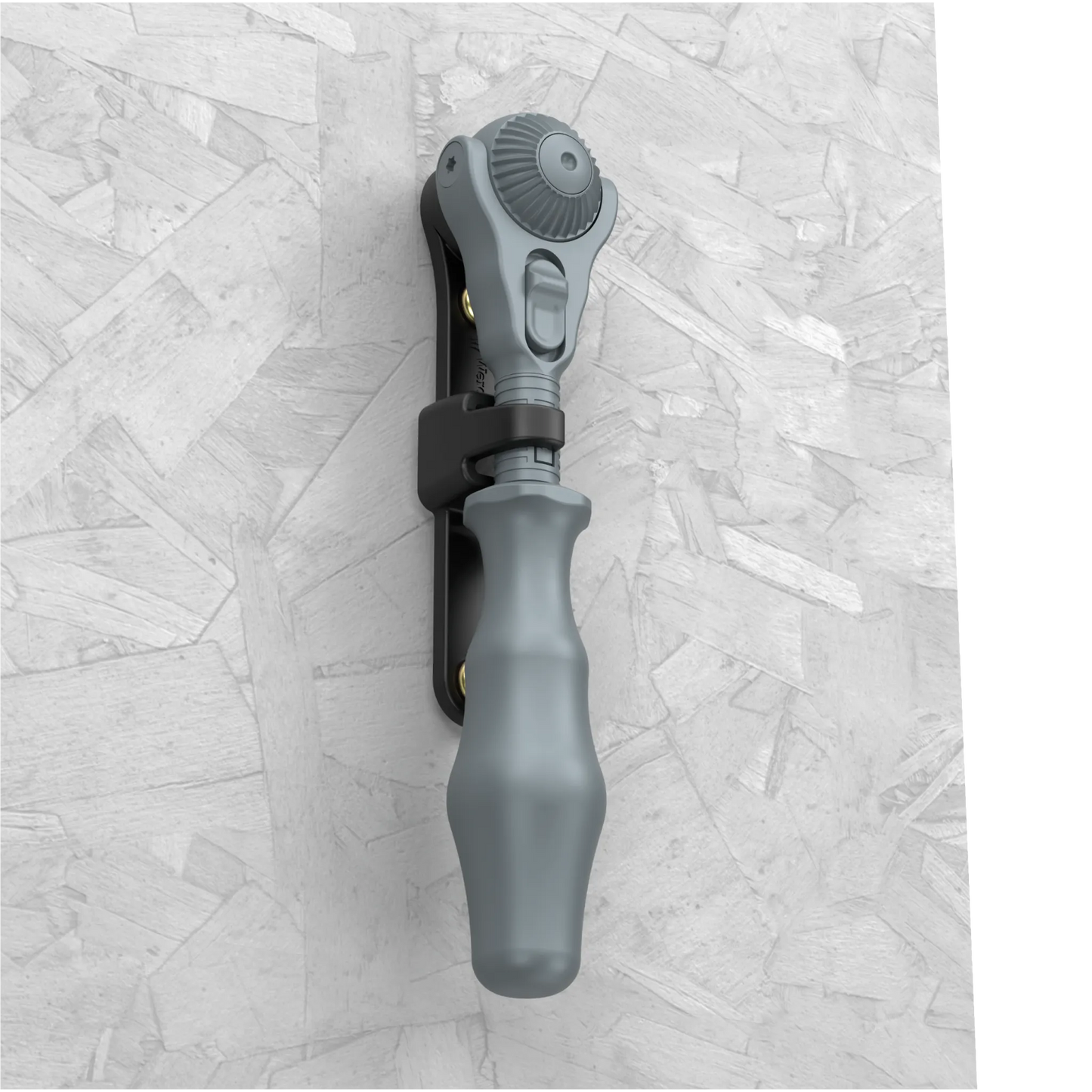 Wera Tool Rebel Zyklop Speed Knarre 3/8 Zoll Halterung mit ausgegrautem Zyklop Speed in der Halterung an einer Wand