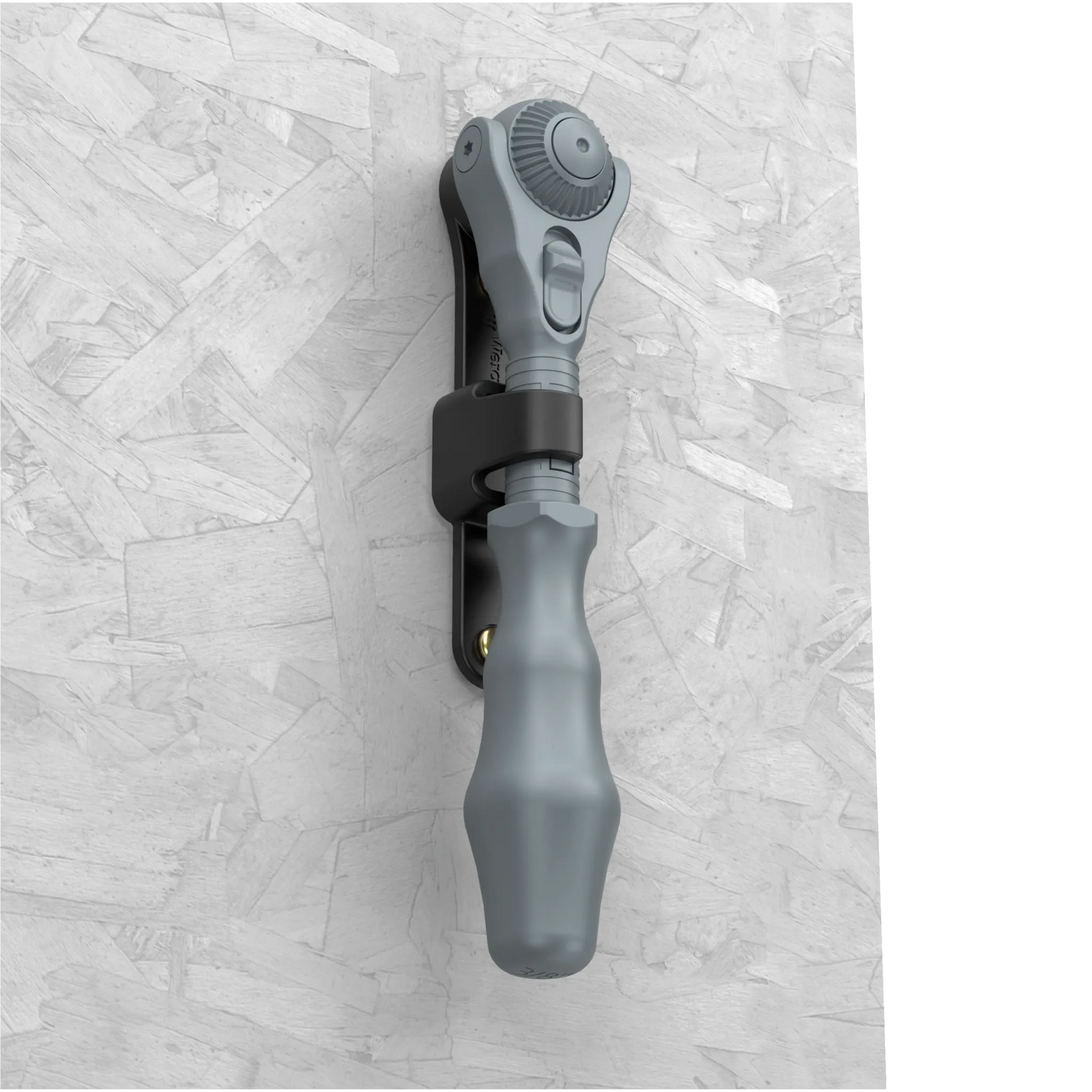 Wera Tool Rebel Zyklop Speed Knarre 1/4 Zoll Halterung mit ausgegrautem Zyklop Speed in der Halterung an einer Wand